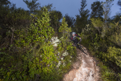 Louis Hamilton rides a mountain bike trail on Rainbow Mountain, Rotorua, New Zealand.