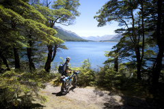 Dallas Hewett rides the trail around South Mavora Lake, Southland, New Zealand.