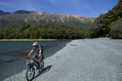Dallas Hewett biking around the North Mavora Lake, Southland, New Zealand.