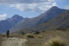 Dallas Hewett biking north on the eastern side of the Mavora Lakes, Southland, New Zealand.