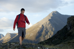 Dallas Hewett hiking with Mount Mavora in the background, Southland, New Zealand.