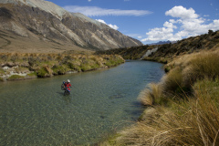 Dallas Hewett crossing the Mararoa River, Mavora, Southland, New Zealand.
