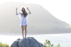 Skinnies ambassador Kristin Crook soaks in the early summer sunshine at Main Beach, Mount Maunganui, Bay of Plenty, New Zealand.