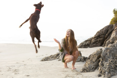 A woman wears a cardigan from the summer campaign for Hello Friday, Dunedin, New Zealand.